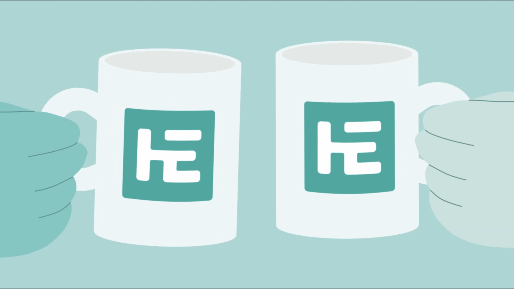 Hands holding two mugs with Harding Evans logo on them